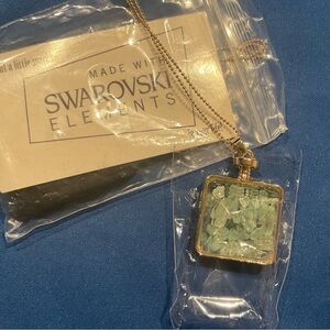 “Jar” pendant filled with Crystals Necklace